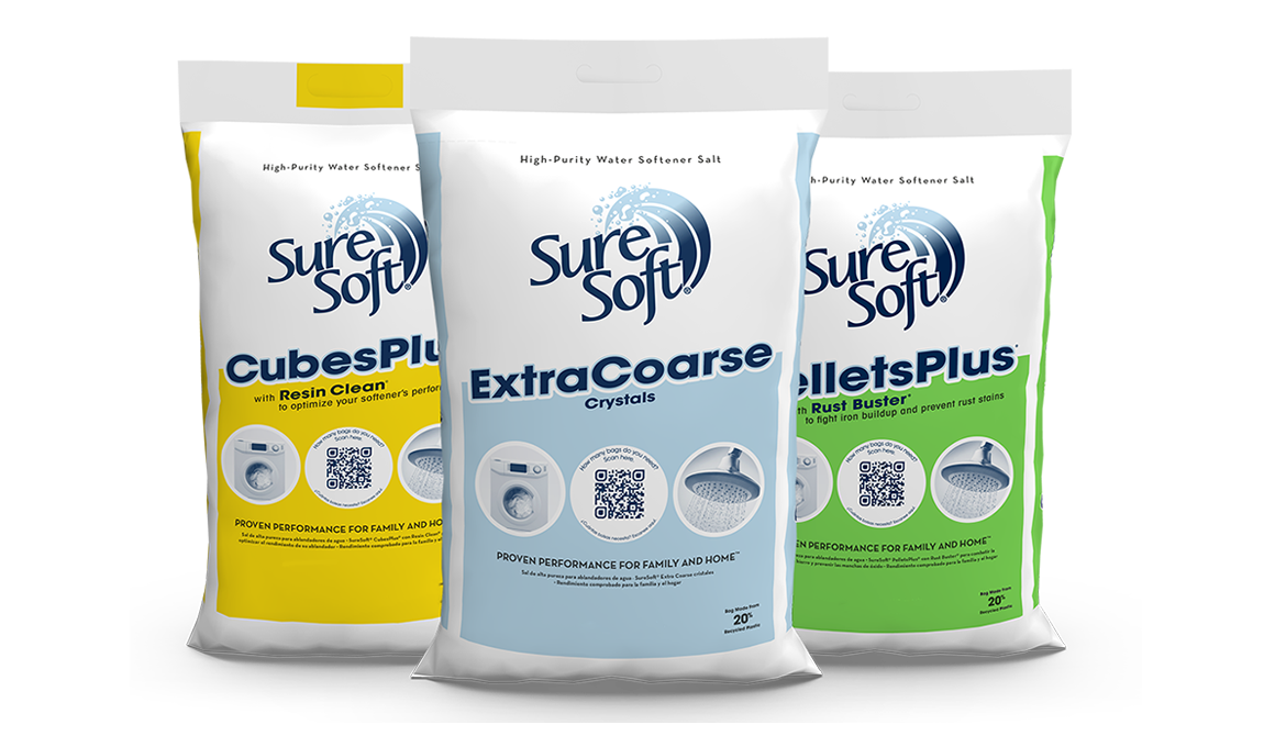 Three SureSoft water softener salt bags.